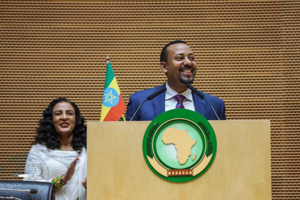 Ethiopian Prime Minister Abiy Ahmed smiling at the African Union Summit